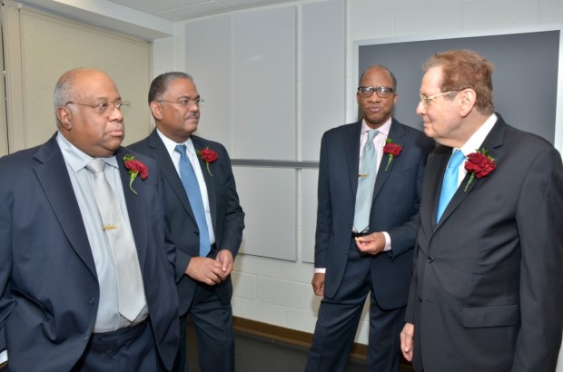 Charles Allen, Admiral Steven Rochon, WilHaygood and Jack Olender at reception.